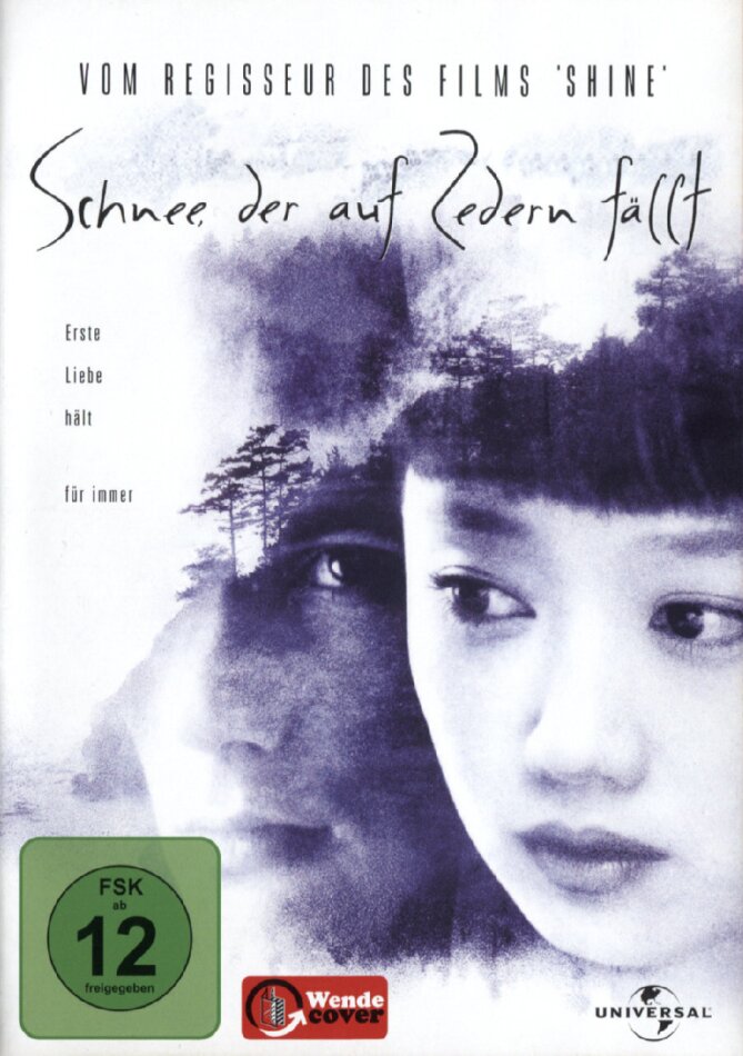 Schnee der auf Zedern fällt